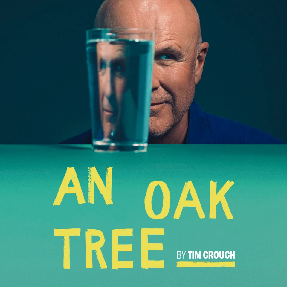 Man looking through glass in An Oak Tree at the The Other Palace - Main Theatre