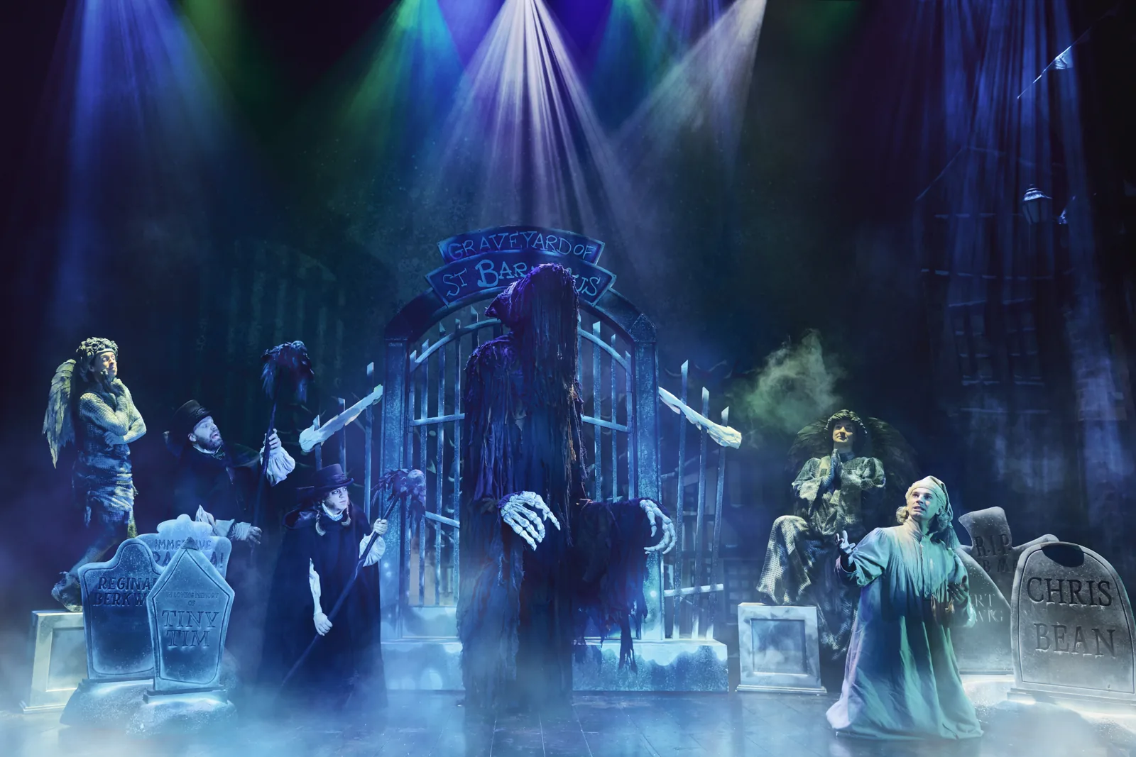 Scrooge kneels before the Ghost of Christmas Yet to Come, Christmas Carol Goes Wrong, Wyndham's