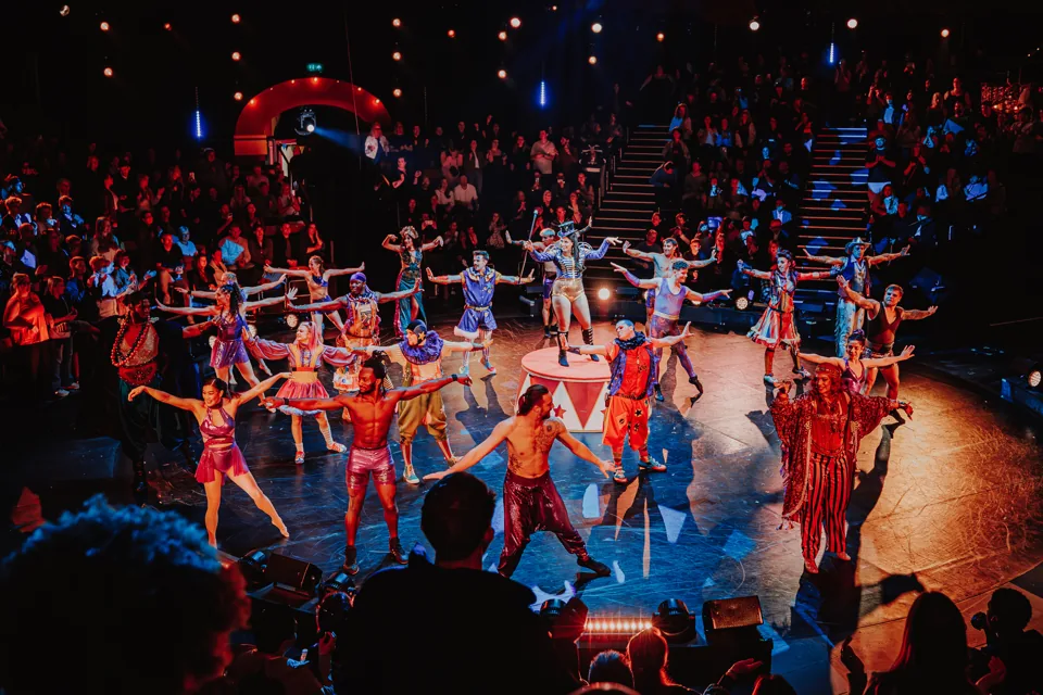 The circus company dance in the ring, the audience all around, Come Alive!, Empress Museum