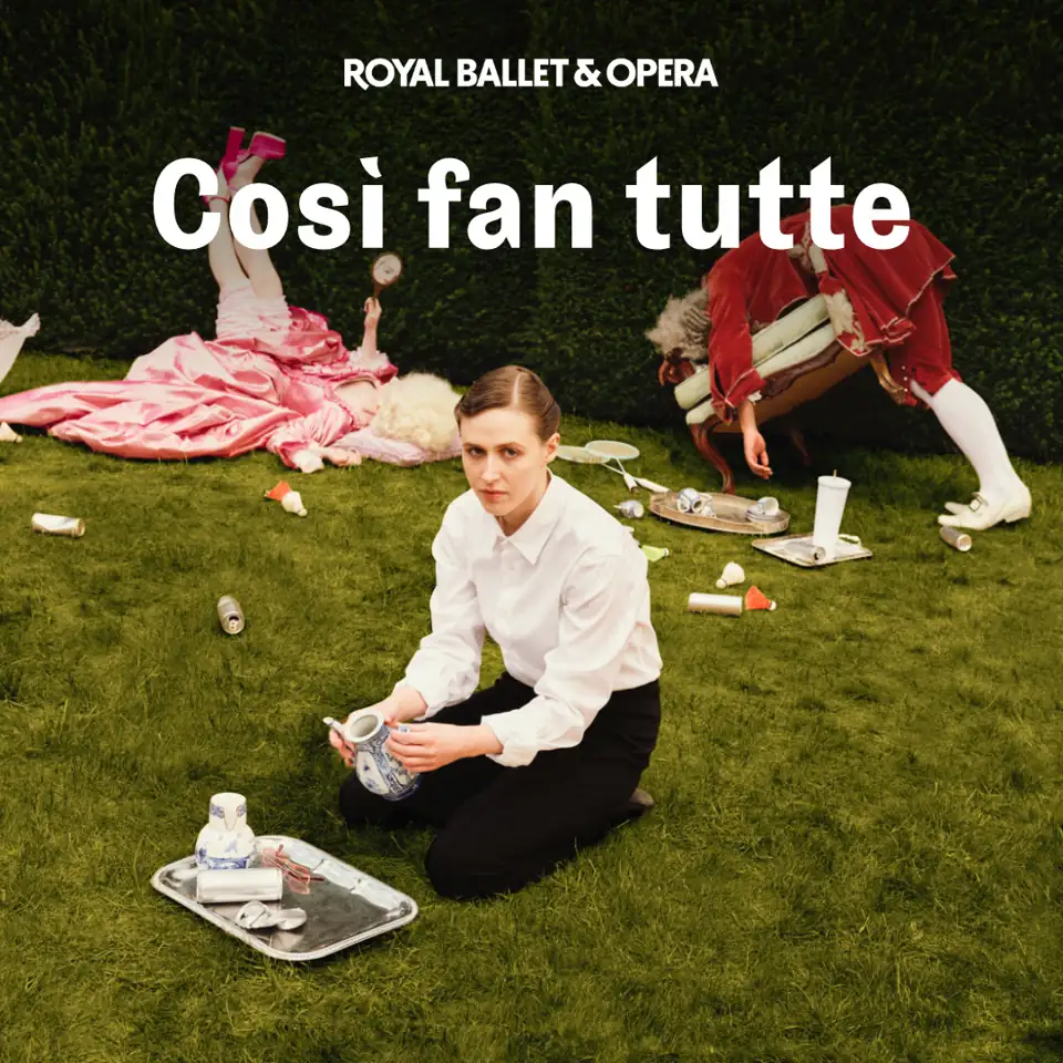 Three dancers on grass in Così fan tutte - Royal Ballet and Opera at the Royal Opera House