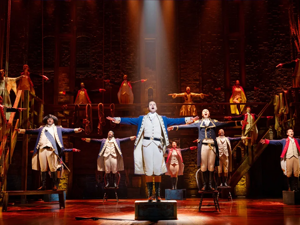 The ensemble in Hamilton at the Victoria Palace Theatre