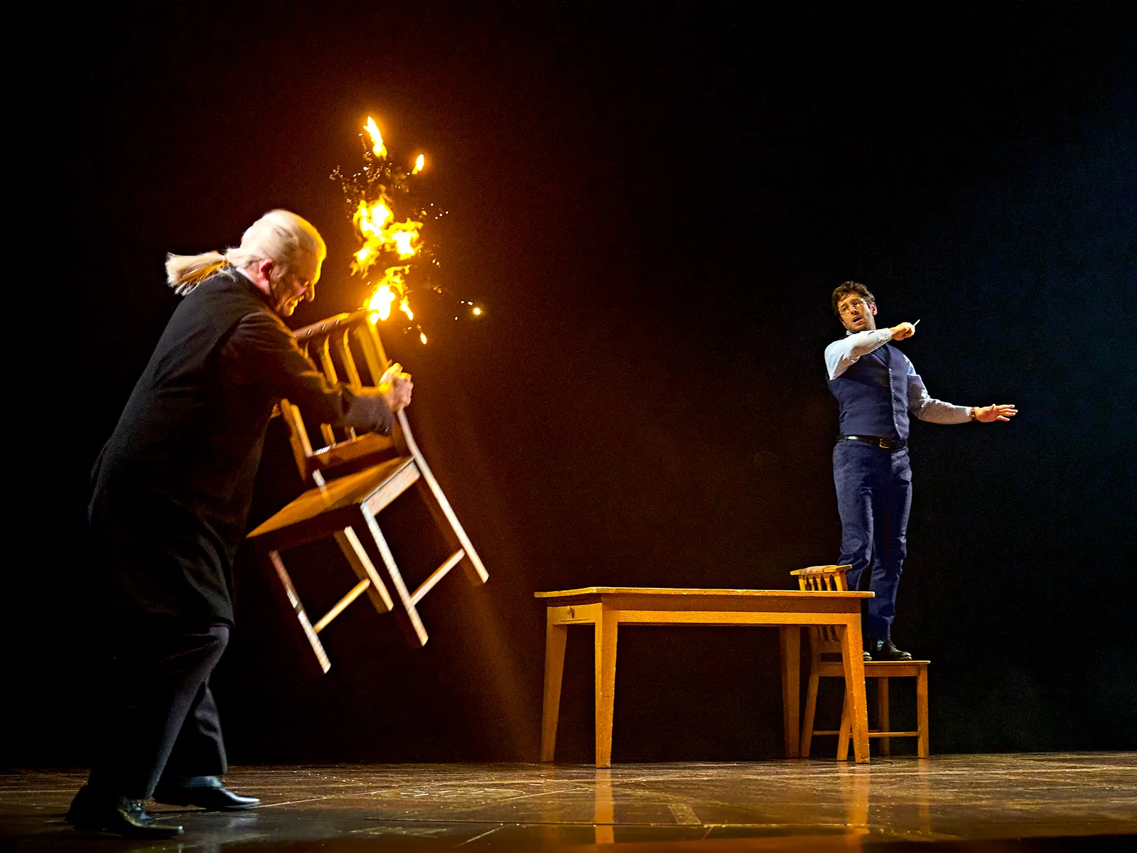 A chair bursts into sparks during a wizards' duel, Cursed Child at the Palace Theatre