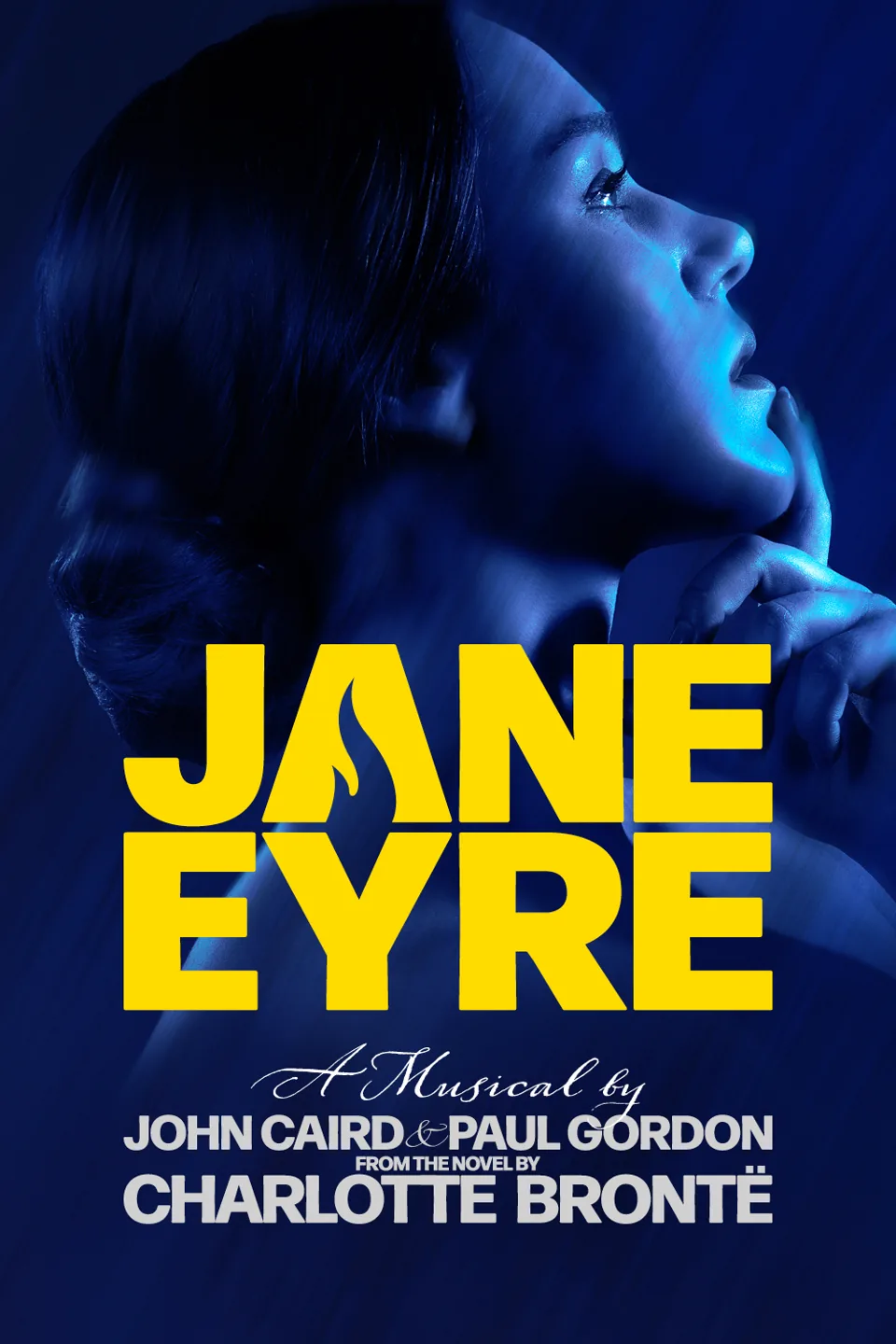Woman in profile against blue lighting in Jane Eyre at the Southwark Playhouse Elephant