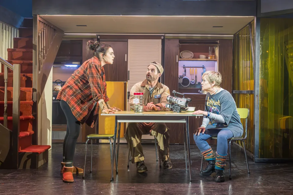 Kimberly and two others round the family kitchen table in Kimberly Akimbo, Hampstead Theatre