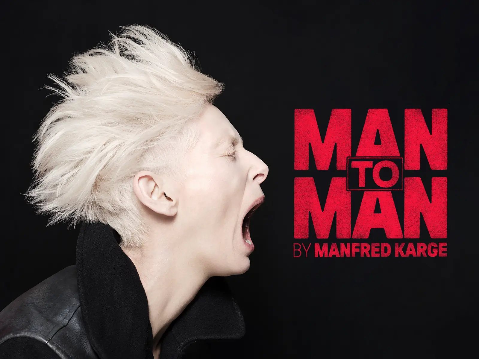 Person with white hair in profile in Man to Man at the Royal Court