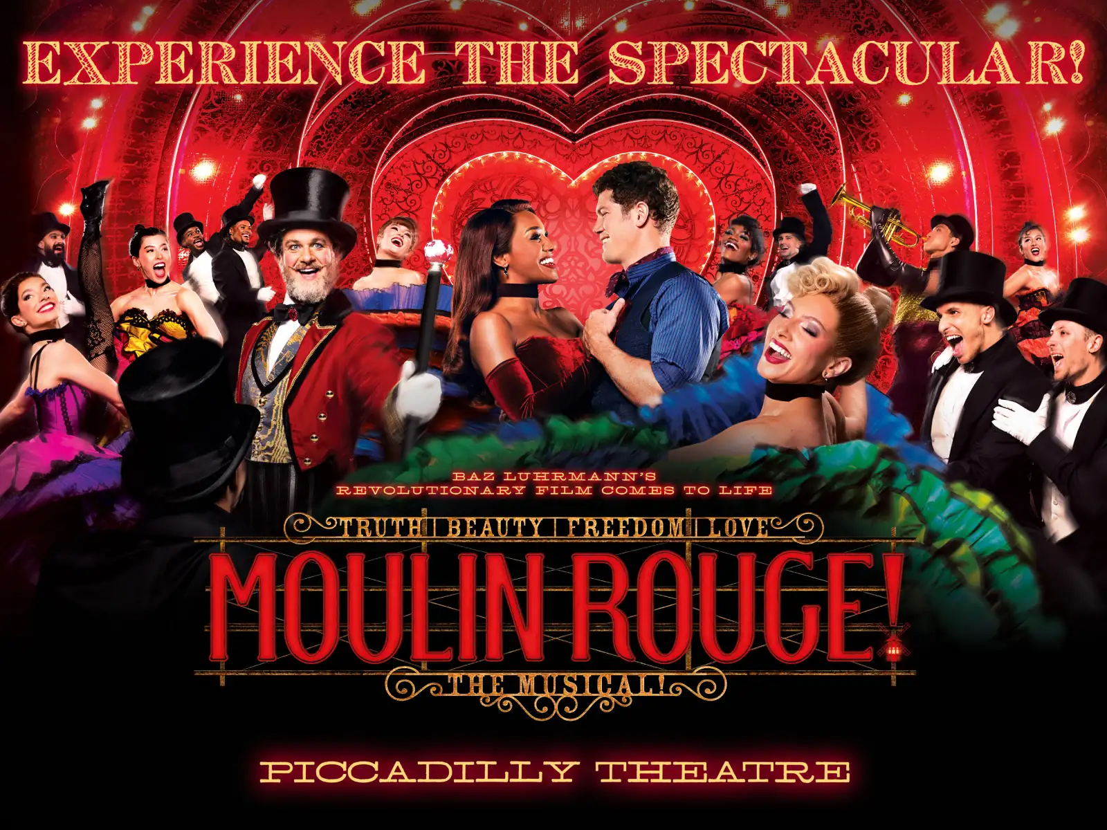 Wide Moulin Rouge! The Musical artwork with the cast around a glowing heart, Piccadilly Theatre