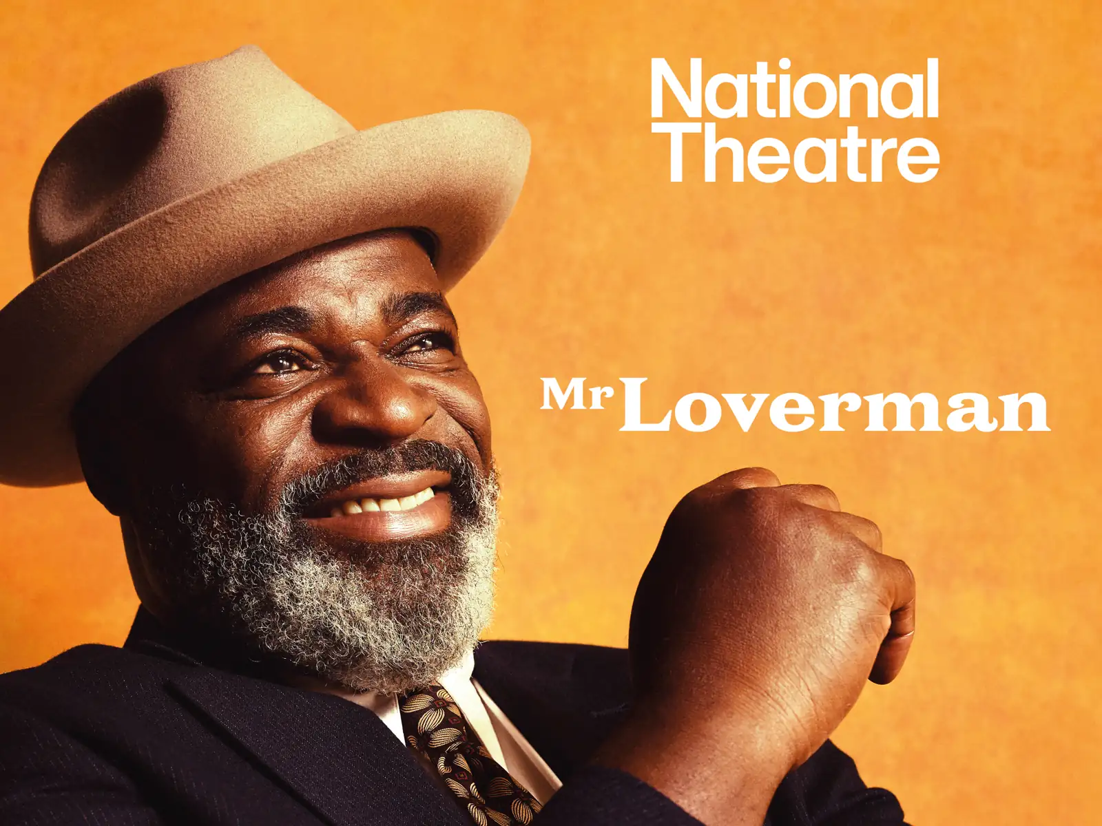 Man in cowboy hat and smart suit in Mr Loverman at the Lyttelton Theatre