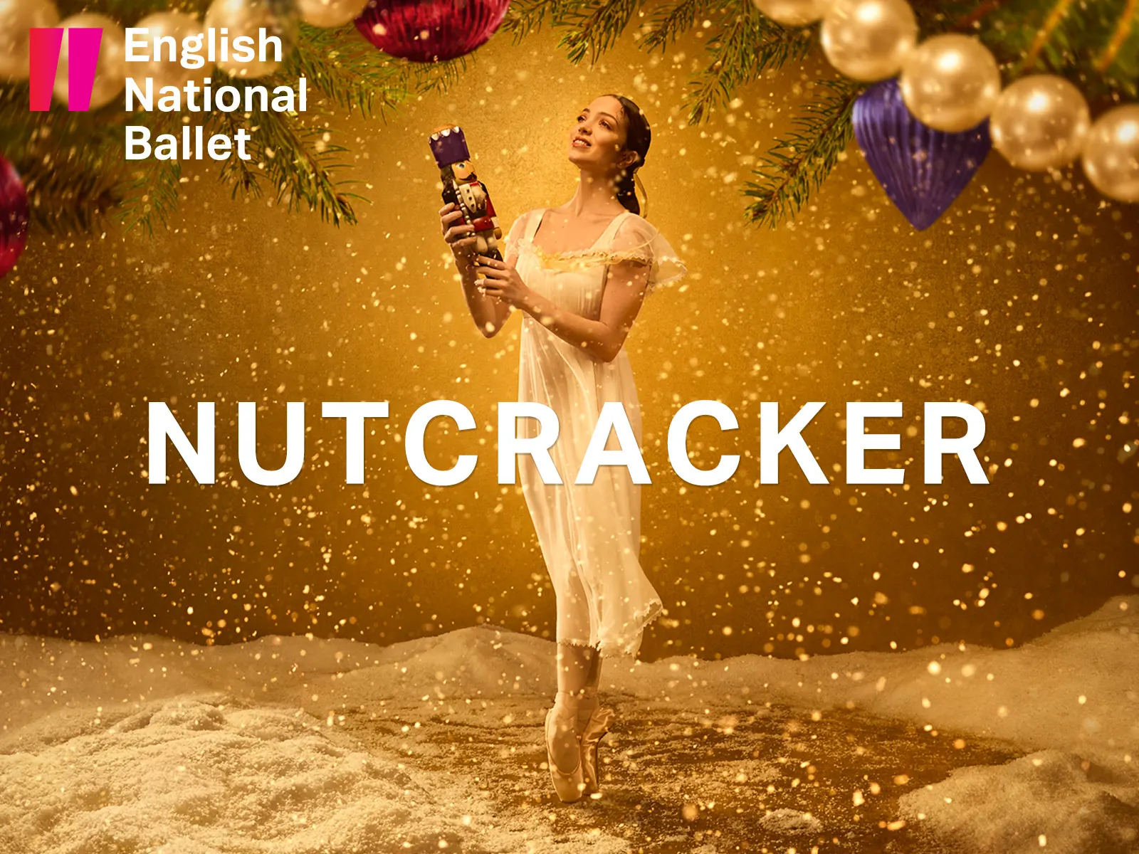 The Nutcracker logo and a dancer with the Nutcracker doll, English National Ballet, London Coliseum