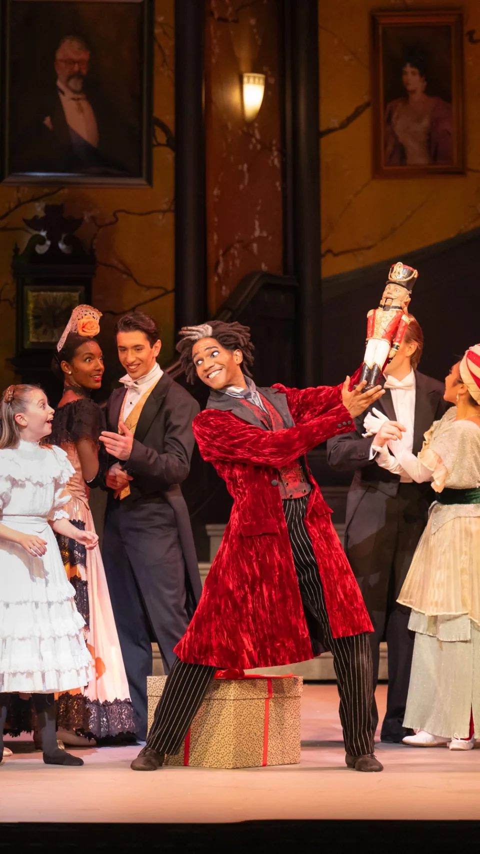 Drosselmeyer holds up the Nutcracker doll at the Christmas party, Nutcracker at the London Coliseum