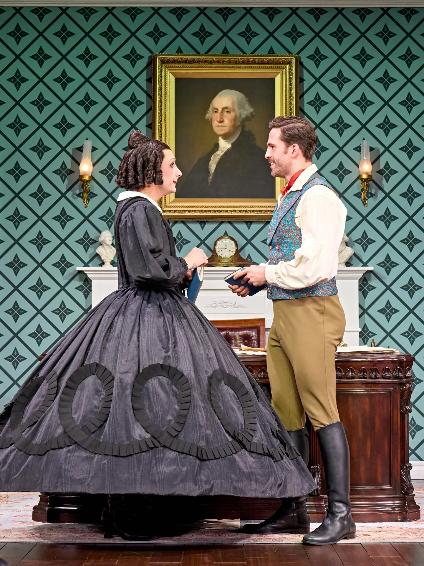 A woman in black and a man in a waistcoat talk: Oh, Mary!, Trafalgar Theatre