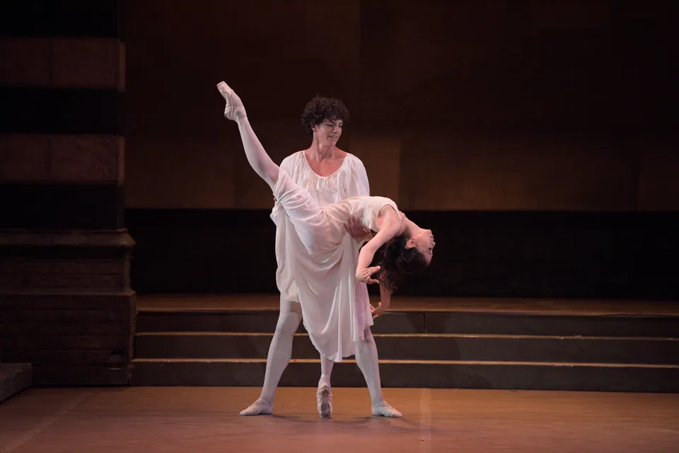 Romeo lifts Juliet as she arches back in Romeo & Juliet, London Coliseum