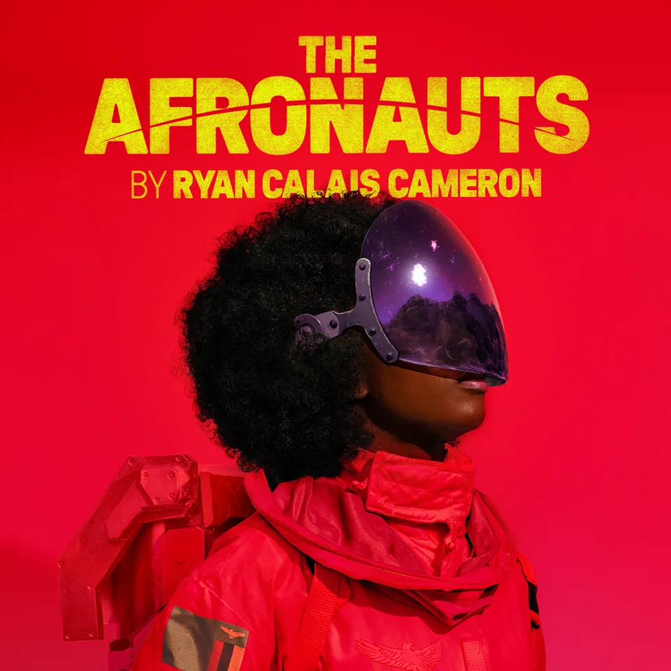 Figure in red jacket and purple helmet in The Afronauts at the Royal Court
