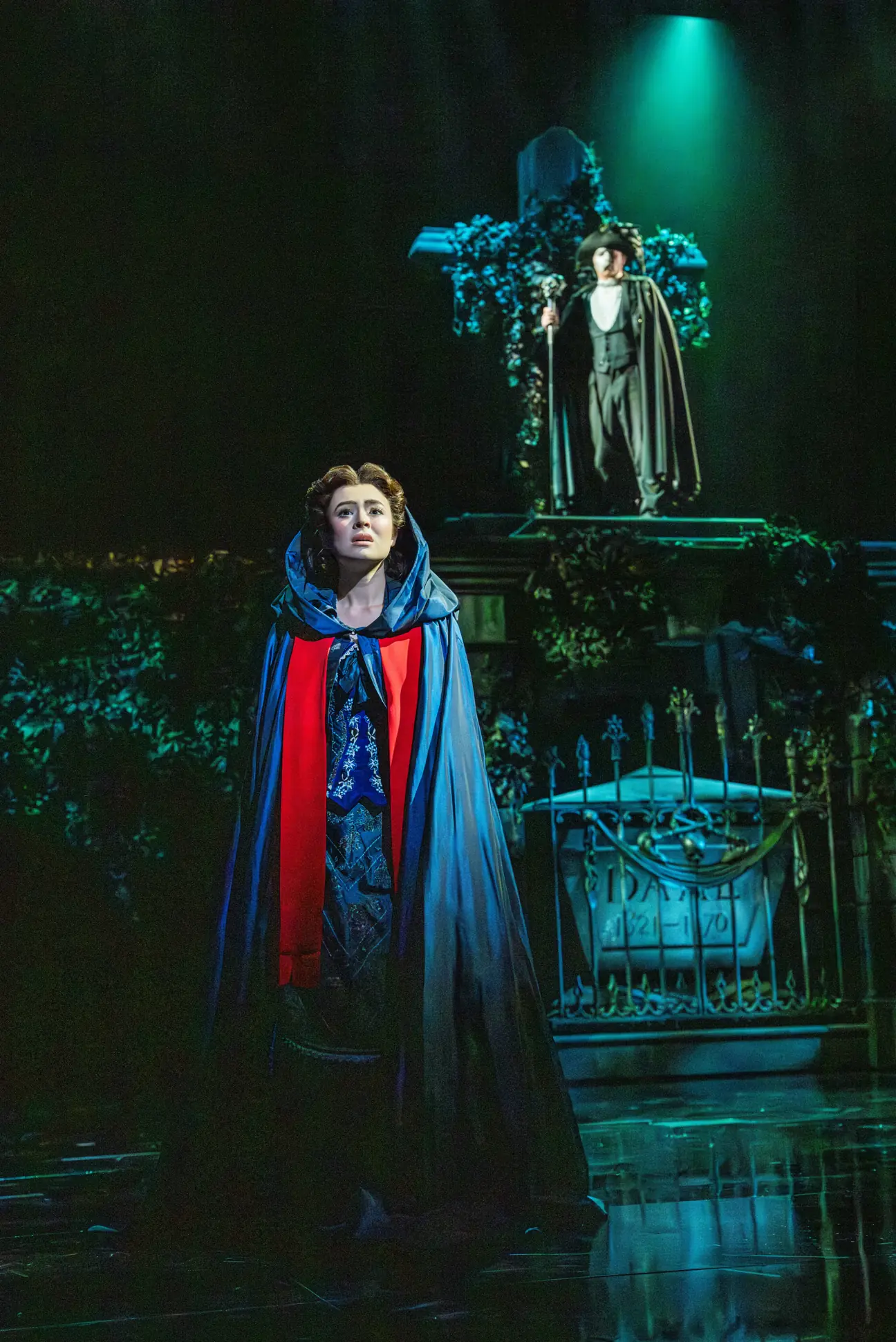 Christine in a hooded cloak in the graveyard, The Phantom of the Opera, His Majesty's