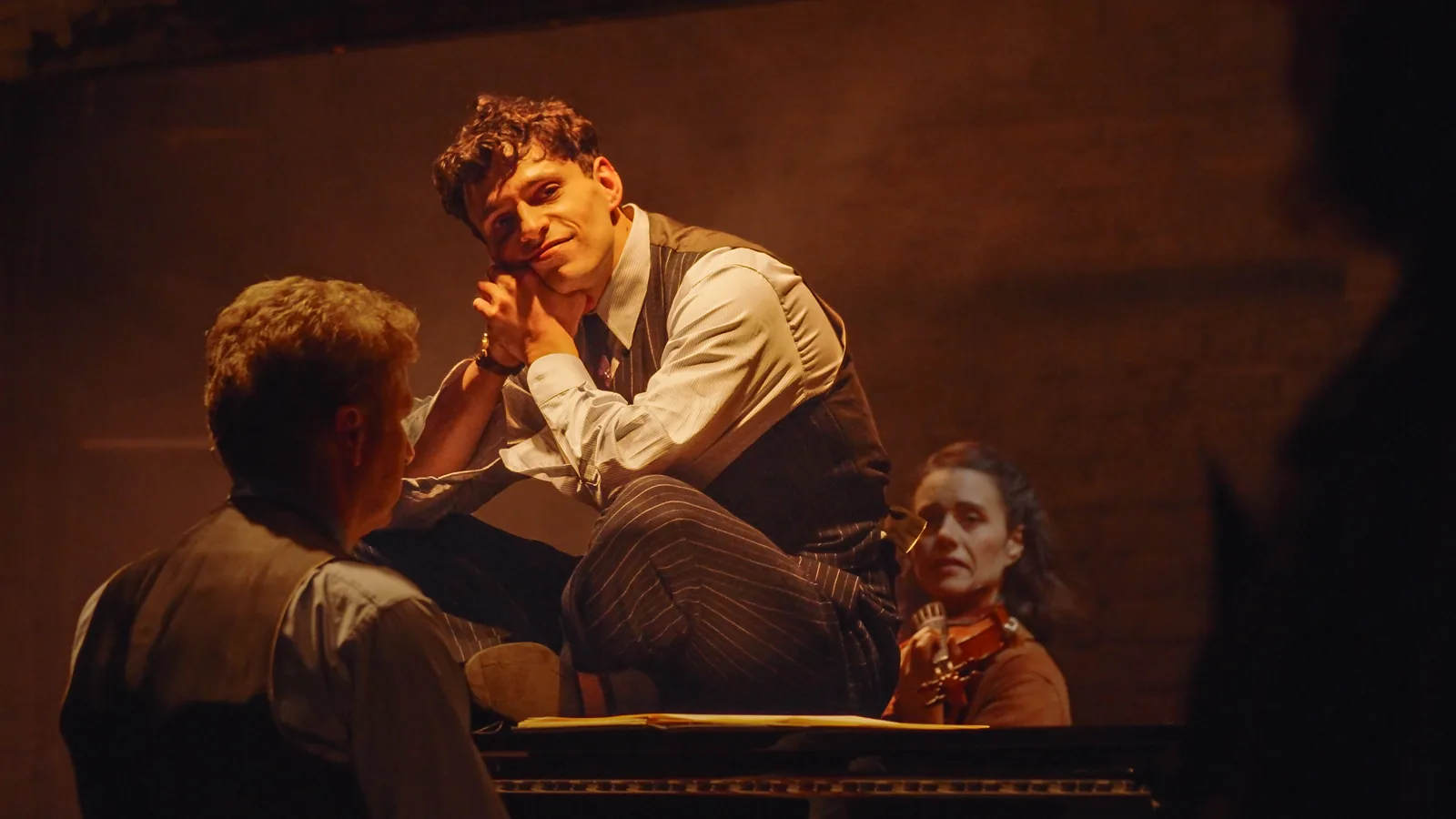 Daniel Krikler as Wladyslaw Szpilman in a close scene at the piano, The Pianist, Park Theatre