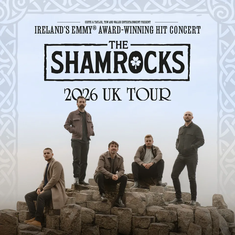 The Shamrocks band stands on ancient stones in The Shamrocks at the Cambridge Theatre
