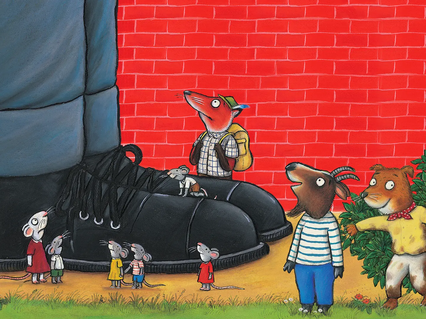 Animals in oversized black shoe in The Smartest Giant in Town at St. Martin's Theatre