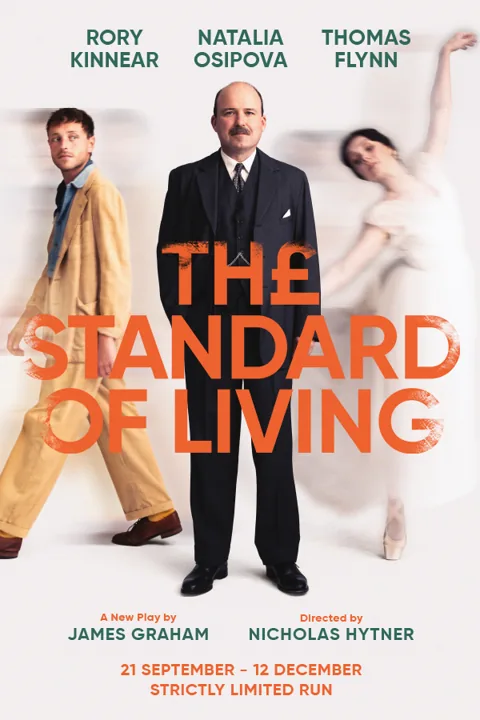 Three performers in orange text in The Standard Of Living at the Theatre Royal Haymarket