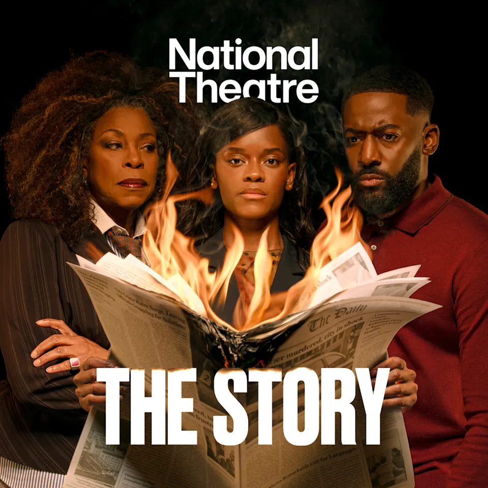 Three performers hold a burning newspaper at the National Theatre's the Olivier Theatre in The Story.