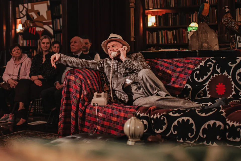 Jesse Tyler Ferguson as Truman Capote on the phone from his sofa, Tru, Menier Chocolate Factory