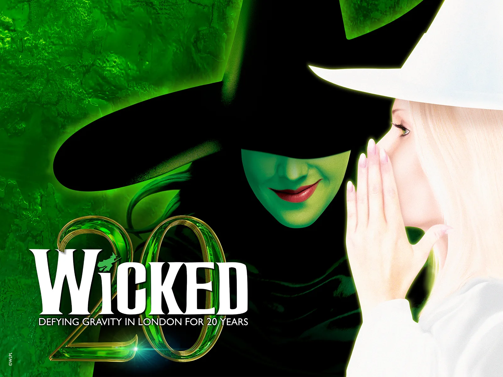 Wicked 20 years in London artwork: green-faced witch and whispering blonde witch, Apollo Victoria Theatre