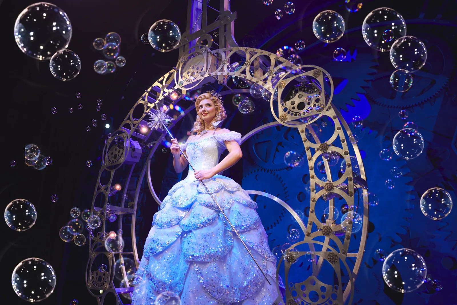 Zizi Strallen as Glinda arrives in her bubble, Wicked at the Apollo Victoria Theatre
