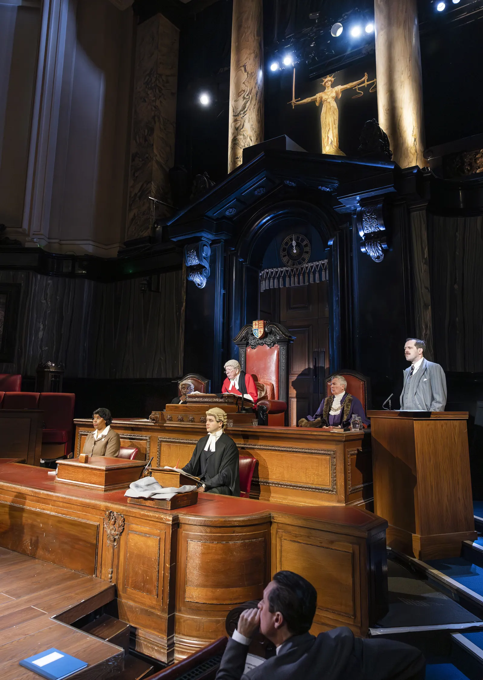 The judge presides in red over the trial: Witness for the Prosecution, London County Hall